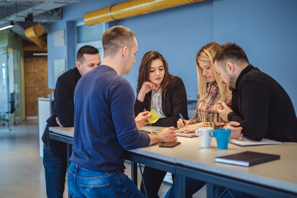 People co-working at a table