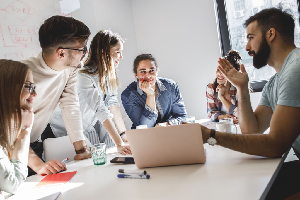 Group of people discussing in a conference room.
