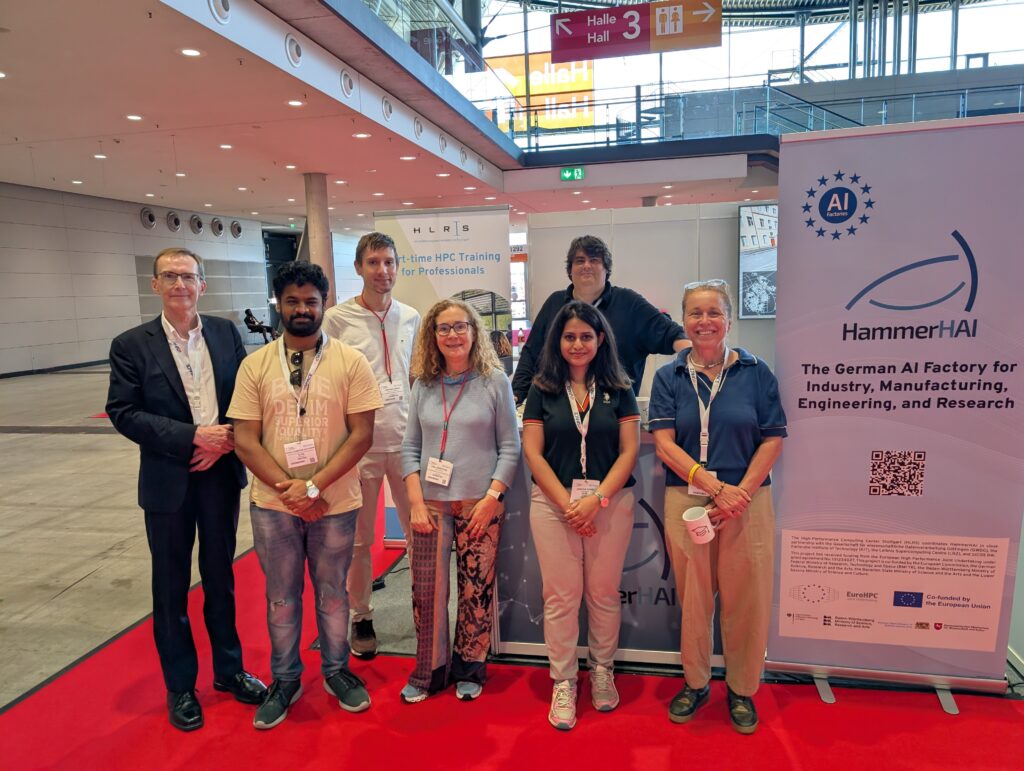 Group Picture at the EXCELLERAT P2 Industry–Academia Collaboration Booth.